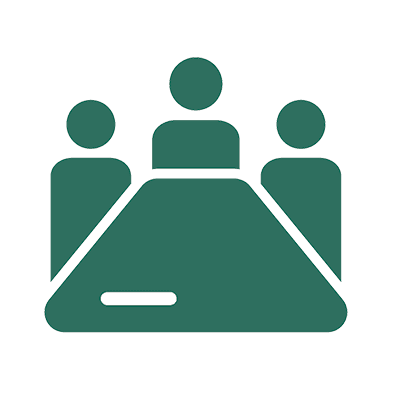 Chris Smith discussing governance frameworks with board members.